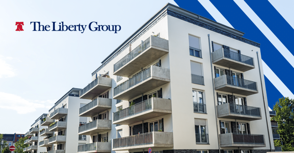 A multifamily residential property with The Liberty Group logo in the upper left corner.