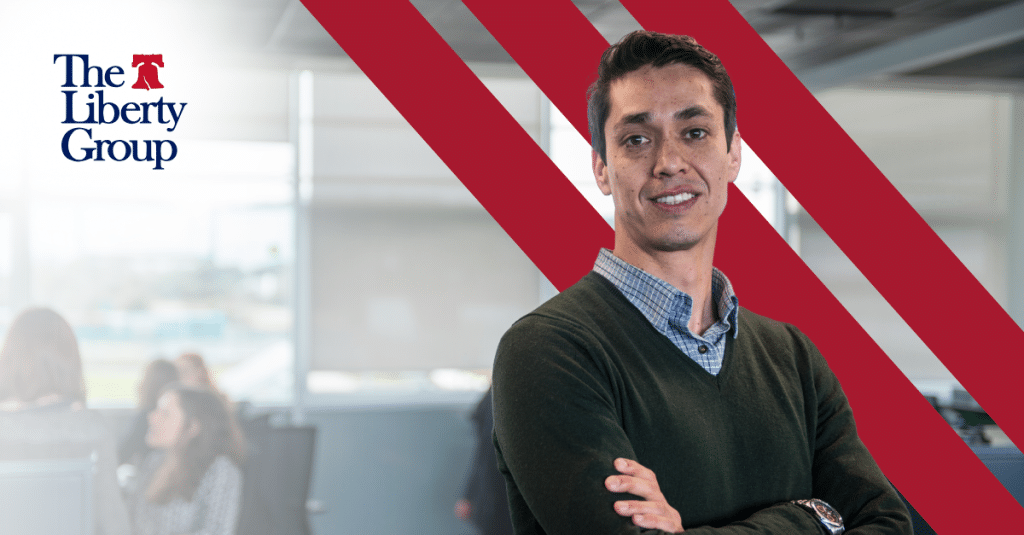 Skilled tradesperson reviewing property plans while preparing to transition into an office-based role in real estate.