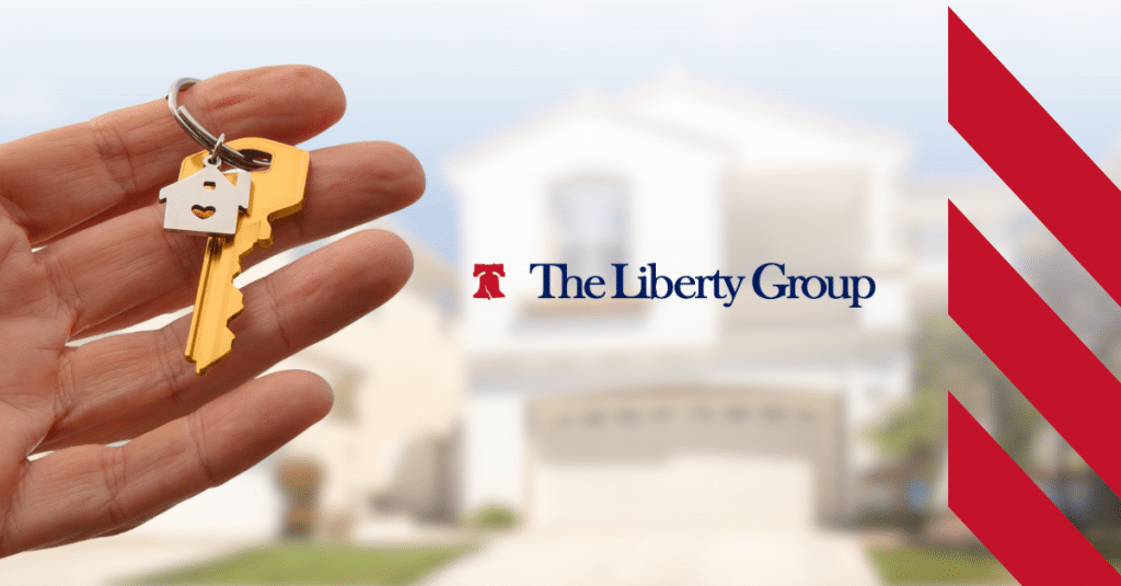 Hand holding a golden key with a house keychain, symbolizing Q4 real estate career opportunities.
